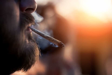 Man Smoking a Marijuana Cigarette